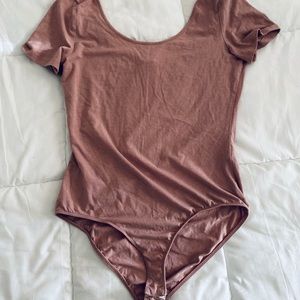 NWOT blush pink body suit from Charlotte Russe